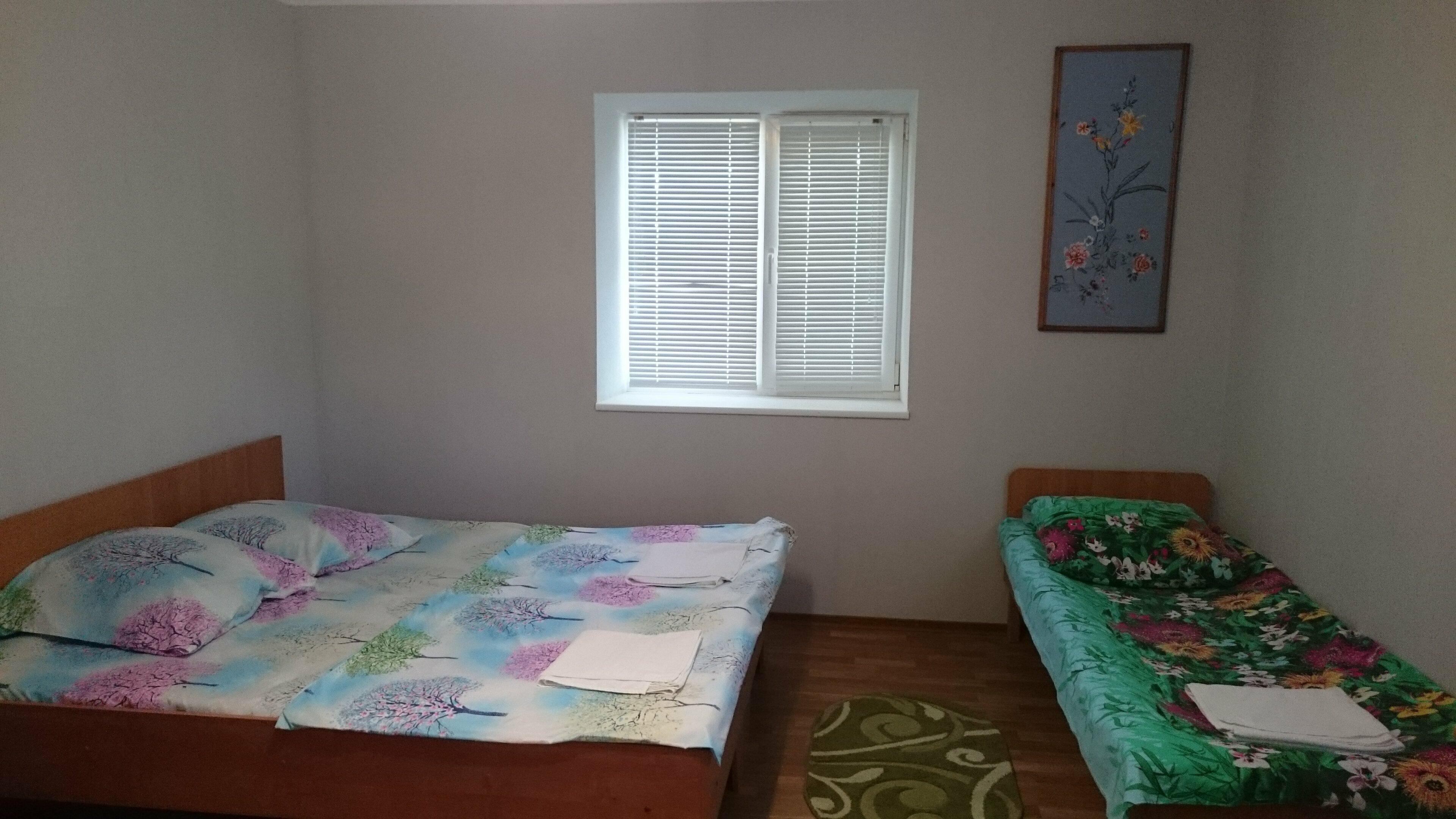 Семейный номер с видом на сад