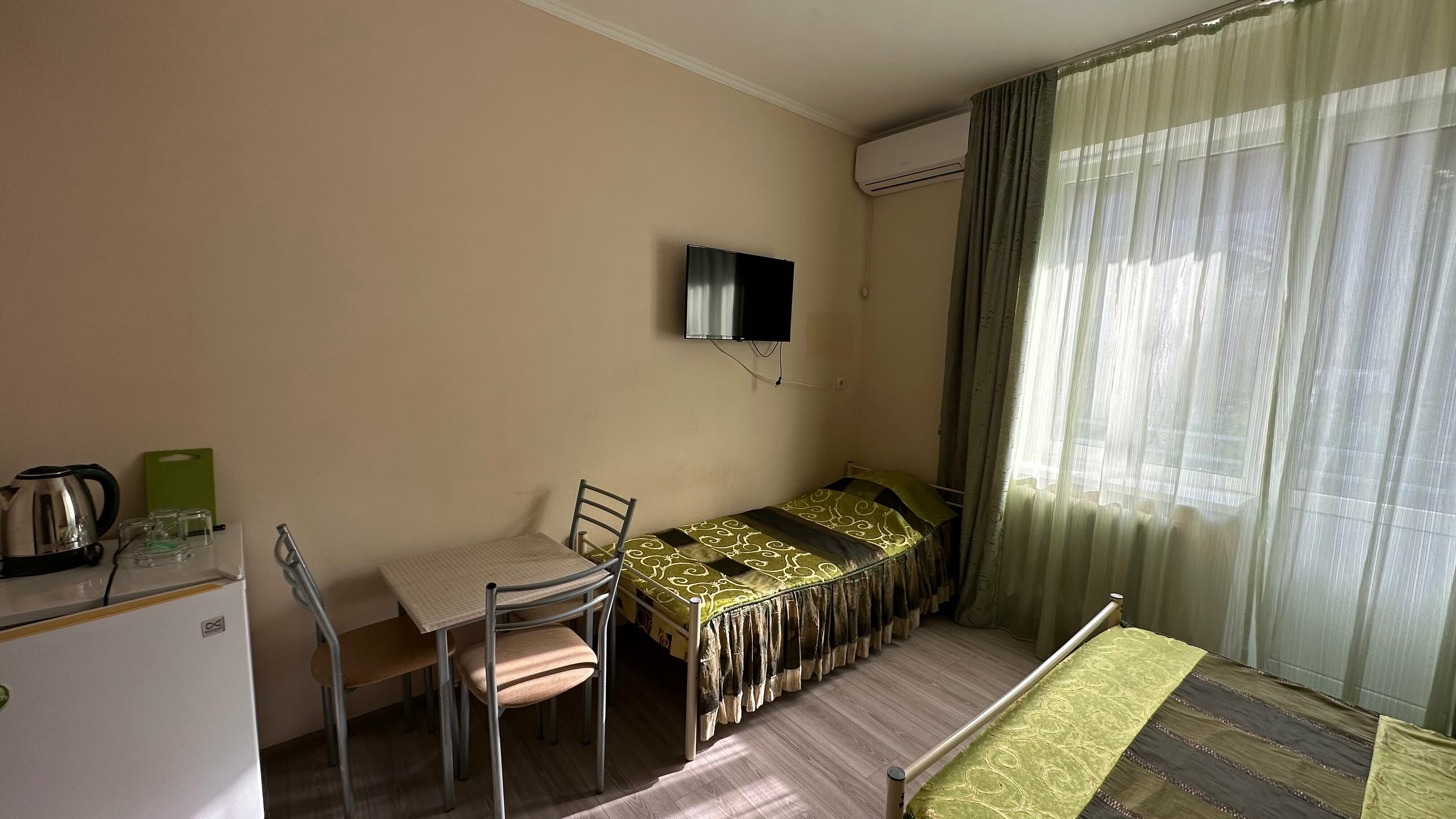 Трехместный номер с балконом