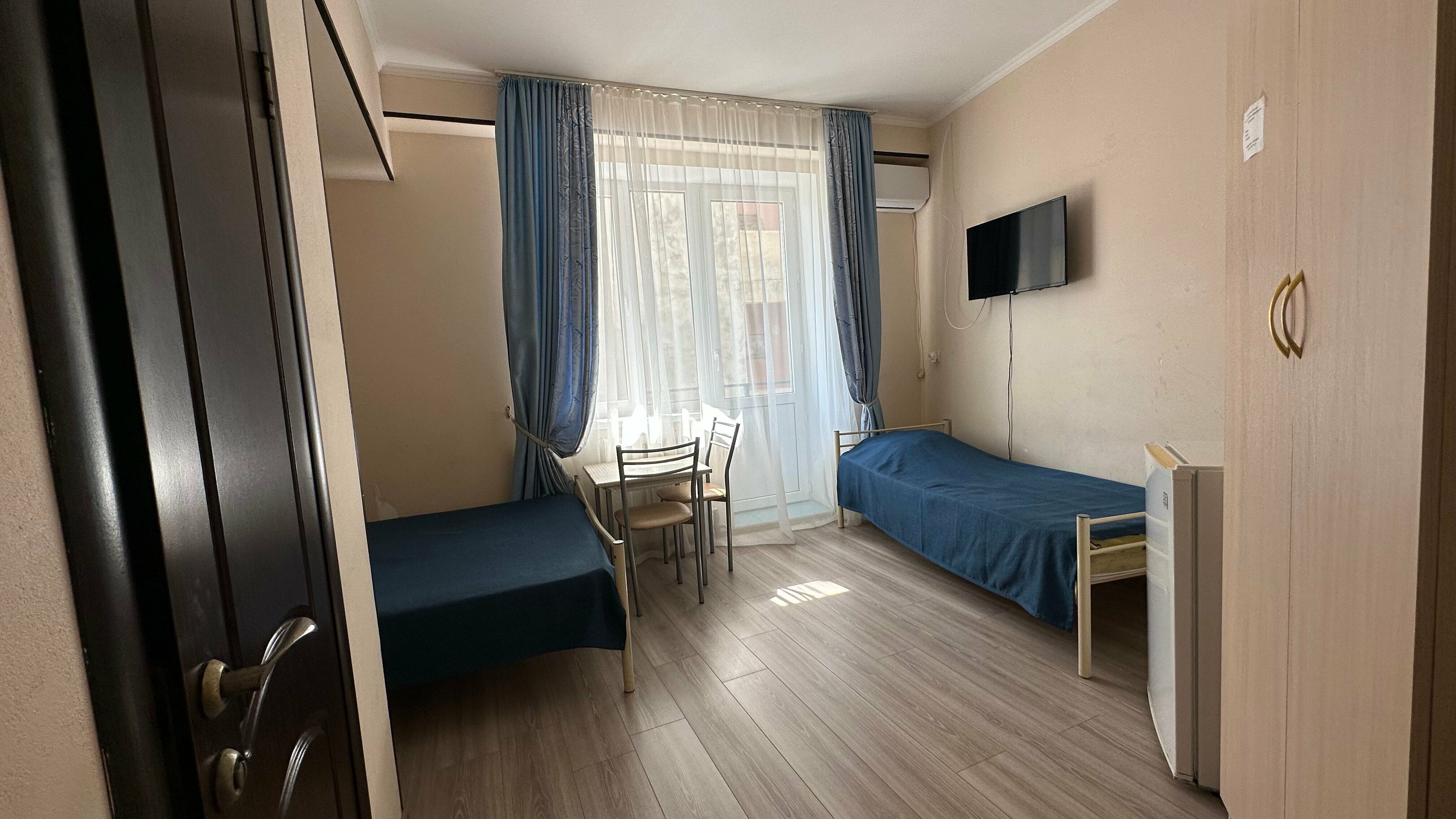 Трехместный номер с балконом