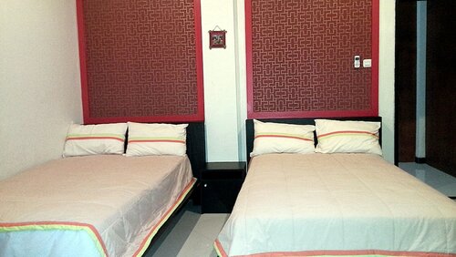 Стандартный двухместный номер с 2 односпальными кроватями в Jaya Phita Guest House