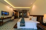 Бунгало, вид на сад в Alibu Resort Nha Trang
