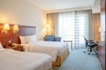 Lake View Deluxe Twin Room в Marriott Executive Apartments Green Community