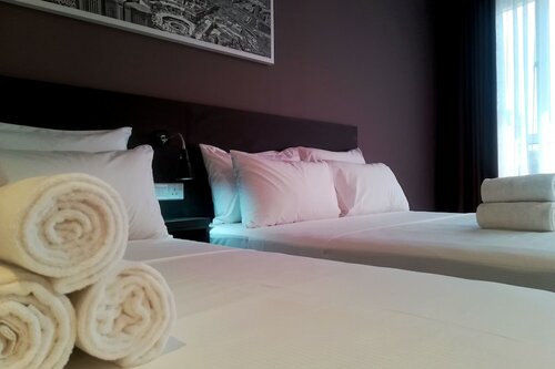Номер «Делюкс» в The Loft Plaza Hotel