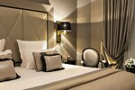 Chambre Deluxe, vue "partielle" mer в Hotel Barriere Le Majestic