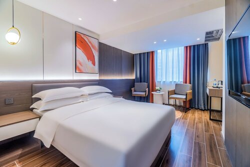 Улучшенный одноместный номер в Ruifeng Hotel Railway Station Store