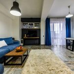 Номер делюкс семейный в Oplot Apartments