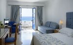 Номер с 2 односпальными кроватями, вид на море в Mitsis Norida Beach Hotel