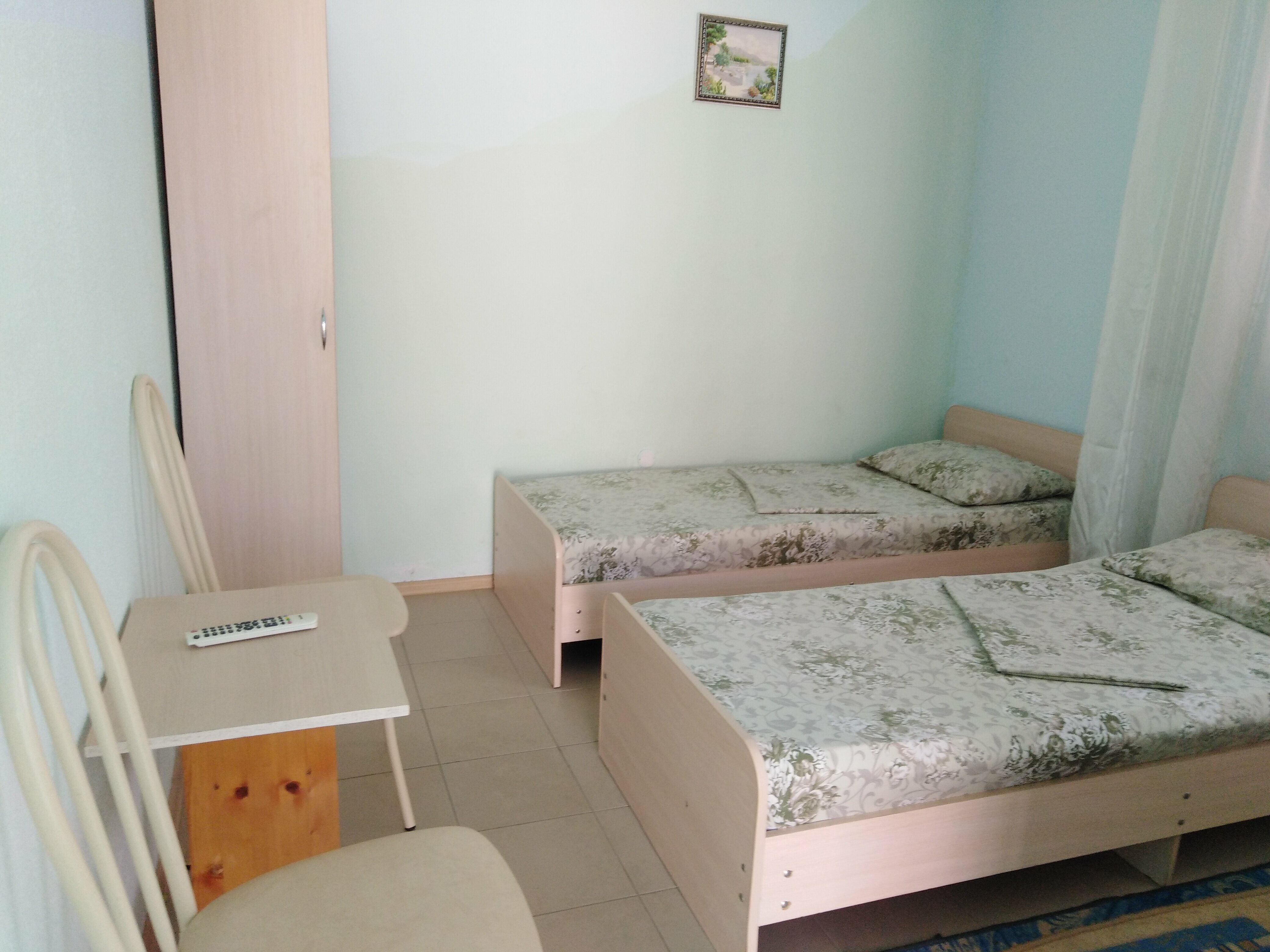 Трехместный номер с видом на горы