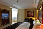 Executive Deluxe King Room в Warwick Hotel