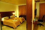 Представительский номер в Srinivas Saffron Hotel