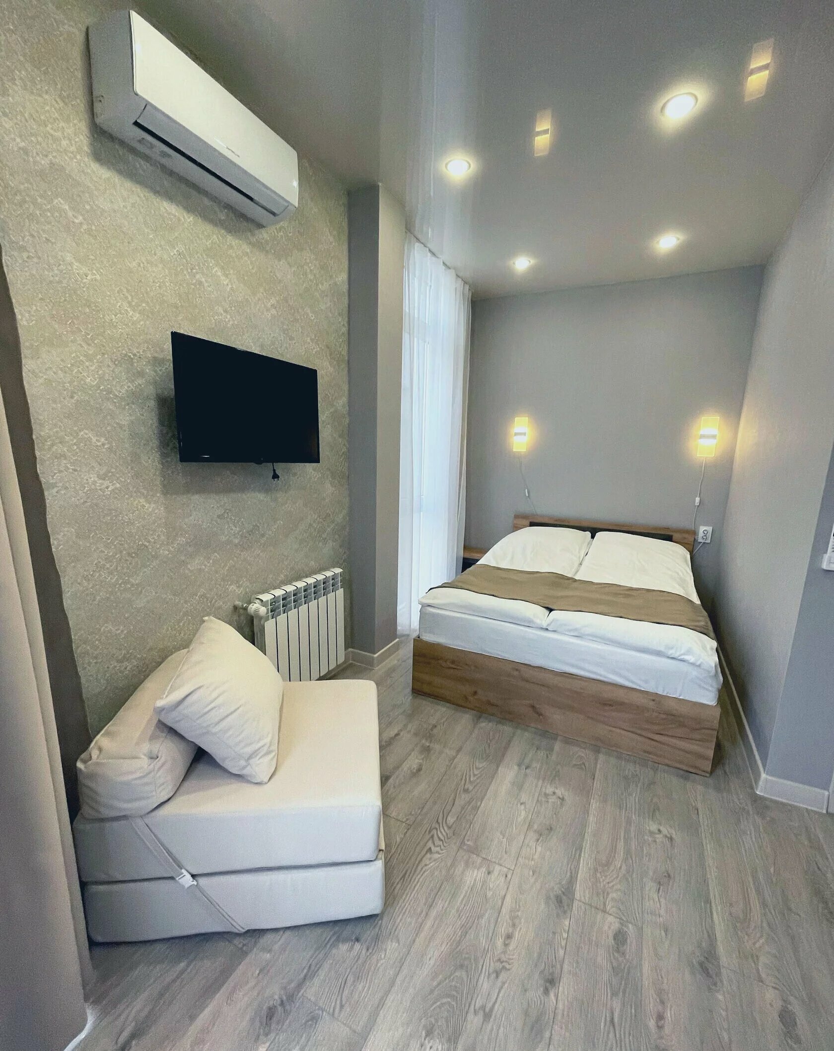 Трехместный номер с балконом