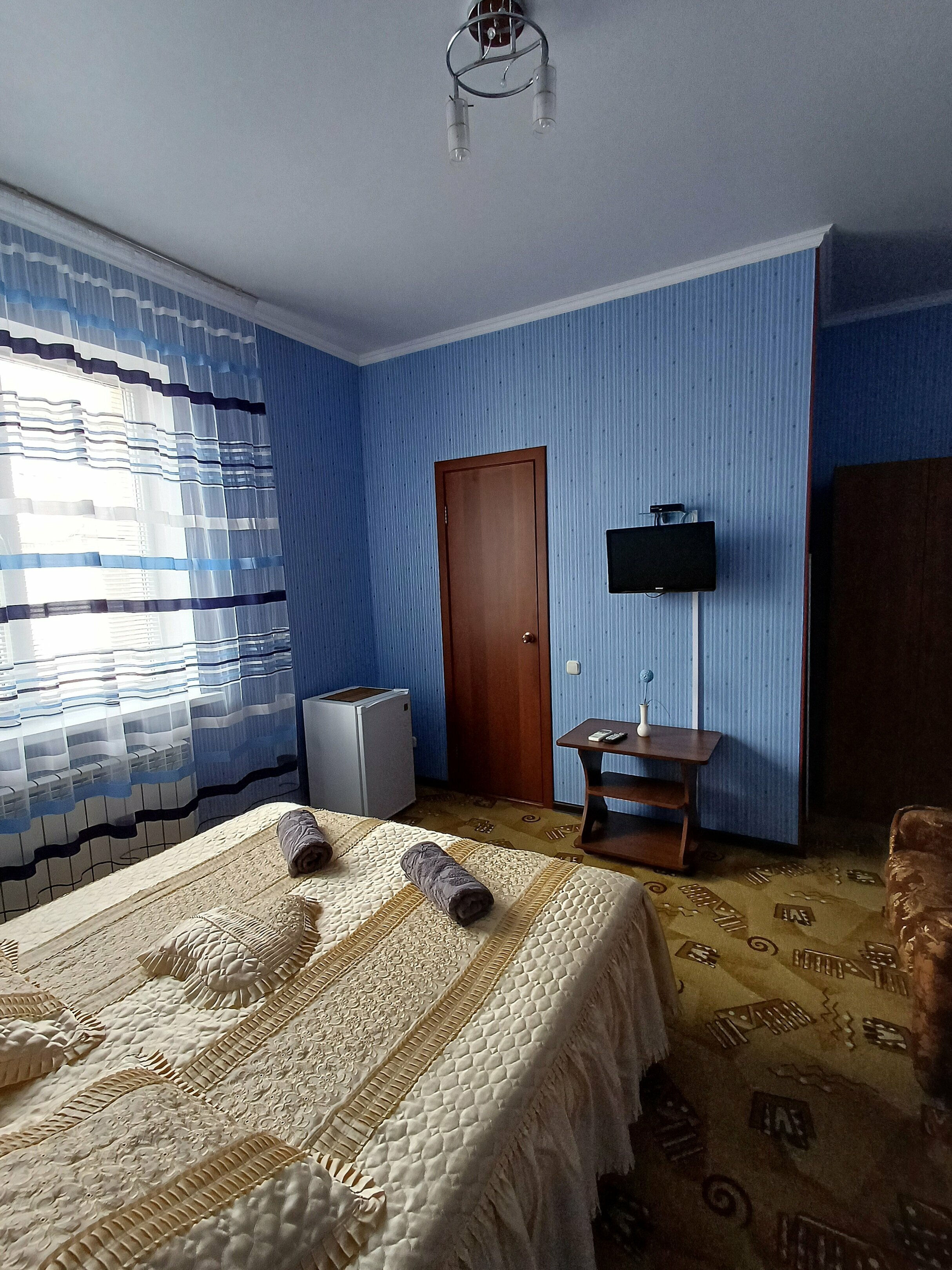 Улучшенный трехместный номер