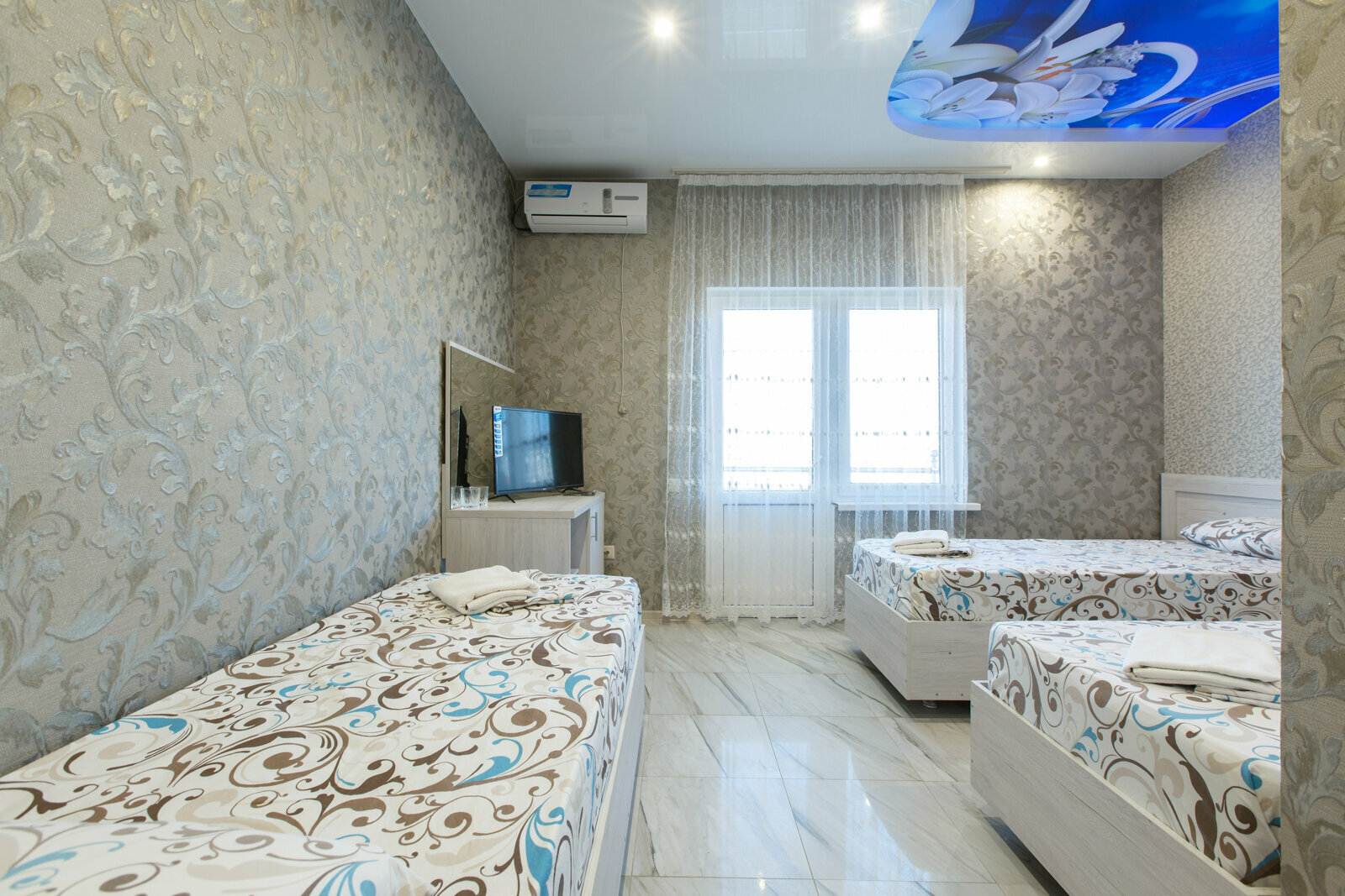 Трехместный номер Делюкс