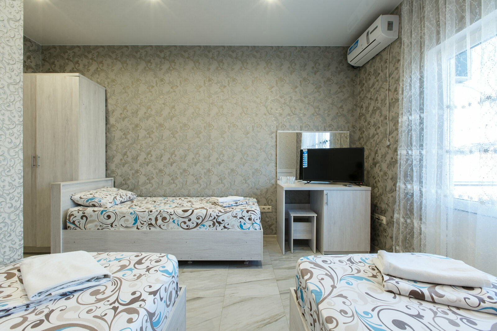 Трехместный номер Делюкс