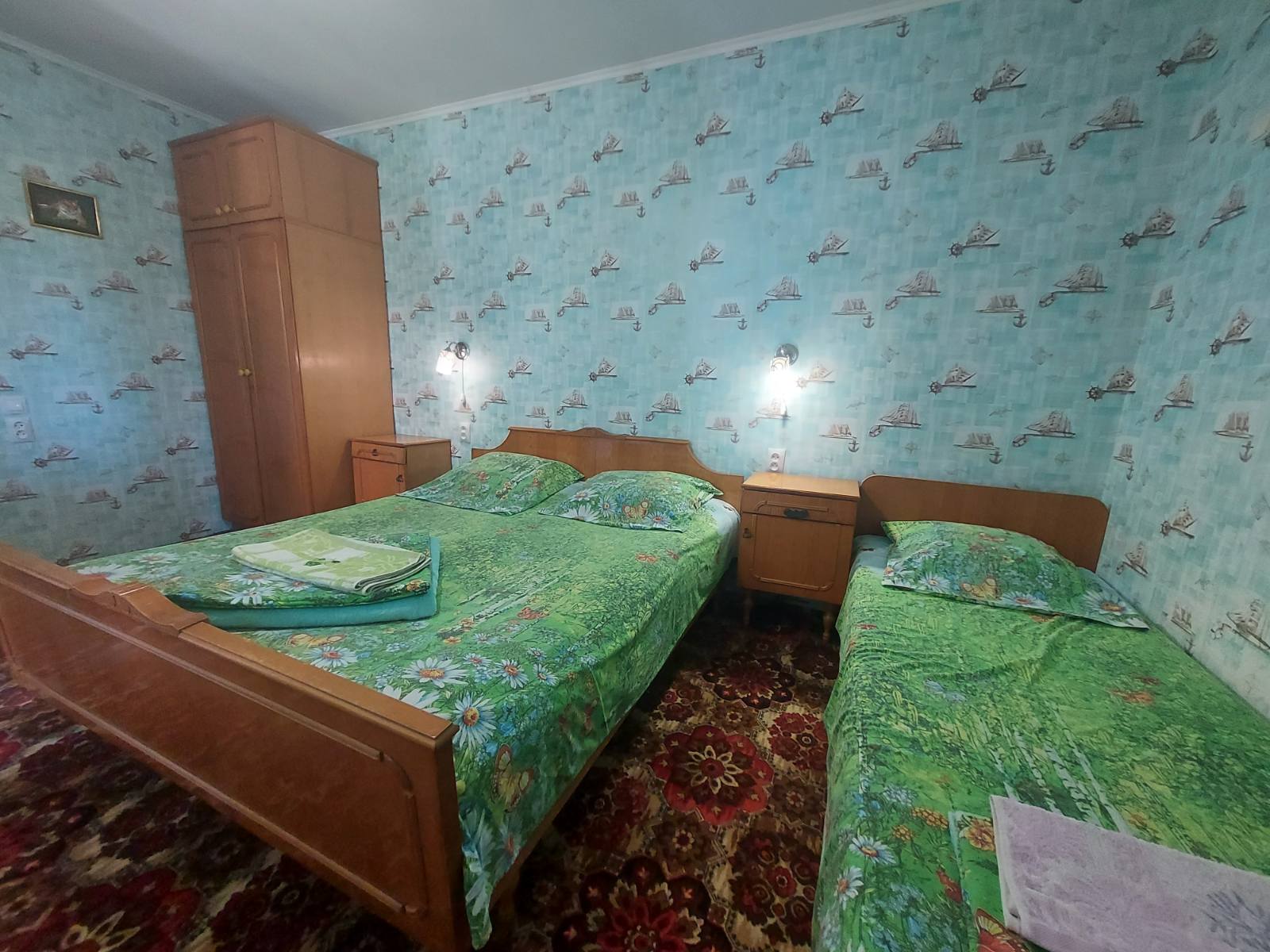 Трехместный номер с балконом