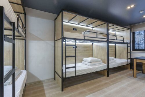 Кровать в общем номере для мужчин в На Рубле