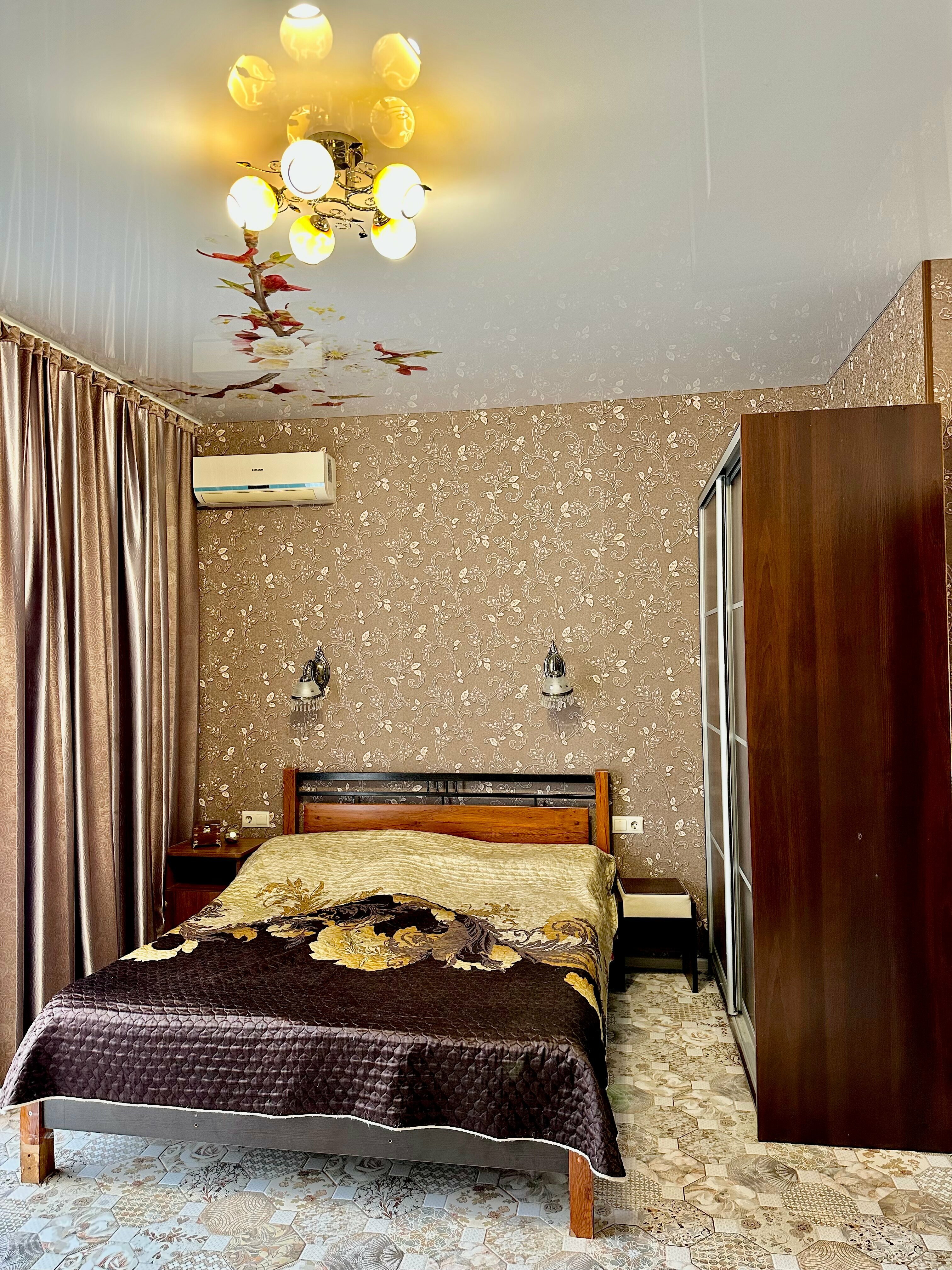 Улучшенный четырехместный номер