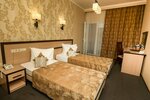 Двухместный номер с 2 отдельными кроватями и балконом в Оазис