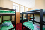 Спальное место на двухъярусной кровати в общем номере для мужчин в Вежливый лось