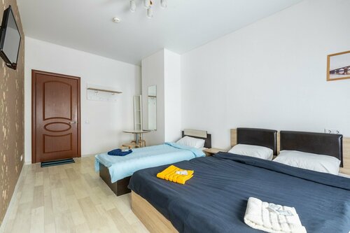 Семейный номер с общей ванной комнатой