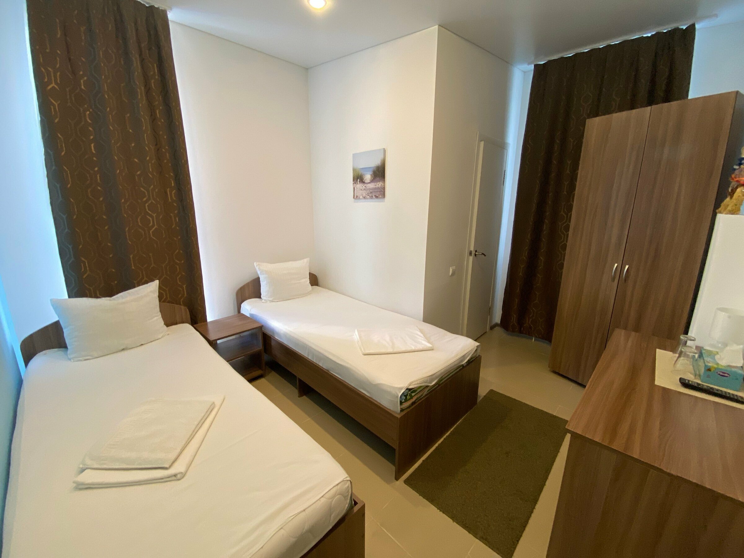 Двухместный номер с 2 отдельными кроватями и окном