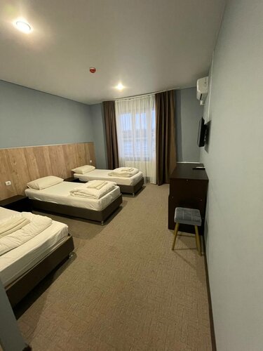 Трехместный номер с основными удобствами