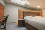 Duplex Suite (Двухъярусный номер с одной двуспальной кроватью и одним раскладывающимся диваном) в Turris Hotel Lubyansky
