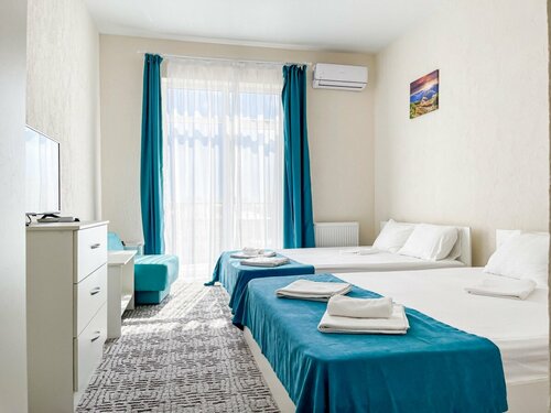 Четырехместный номер с балконом в Дэлани