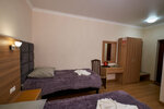 Стандартный двухместный номер с 2 отдельными кроватями и общей ванной комнатой в Зима-Лето Терскол