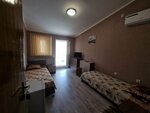 Двухместный номер с 1 кроватью или 2 отдельными кроватями и общей ванной комнатой в Кубаночка