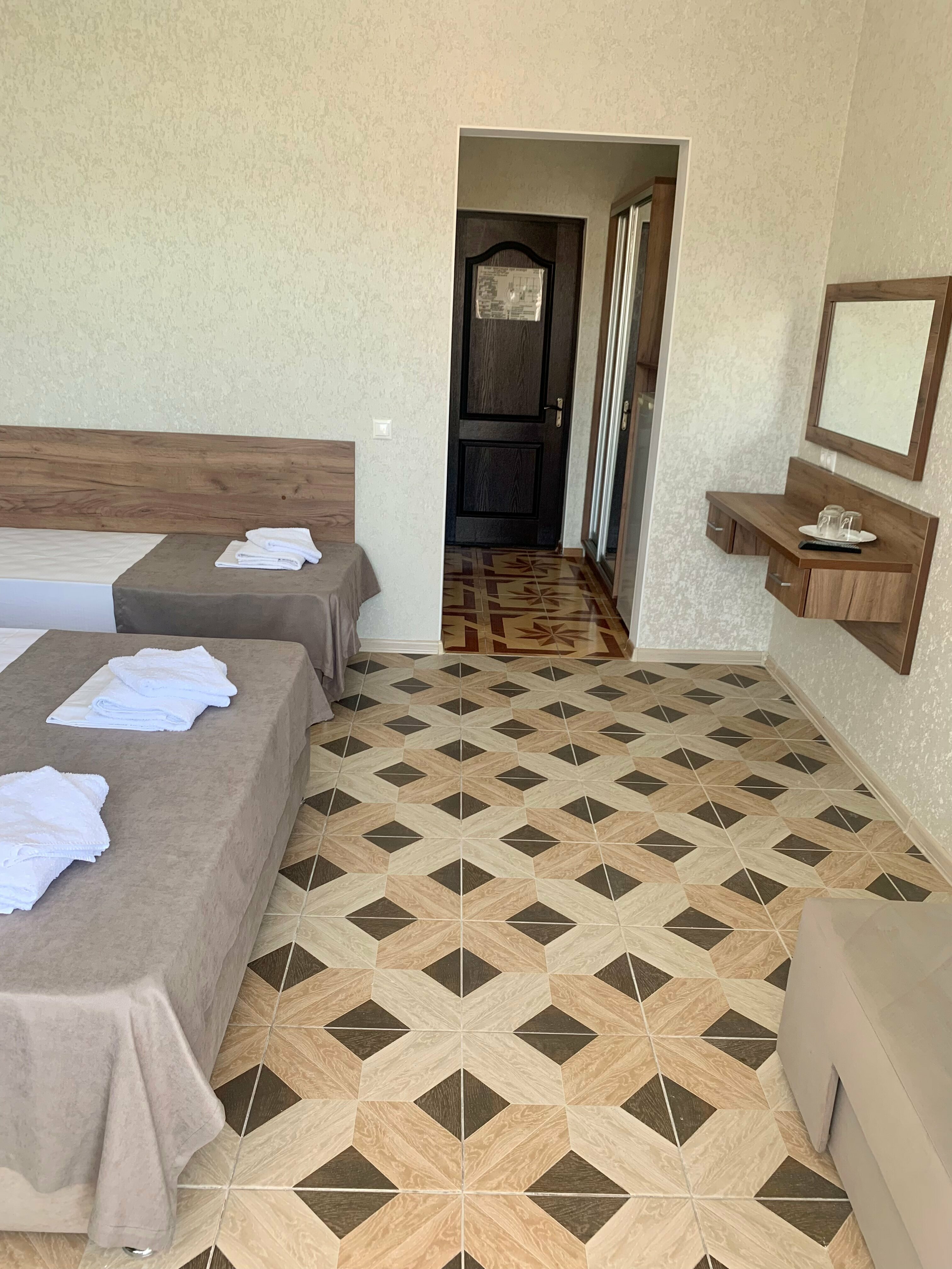 Четырехместный номер Делюкс