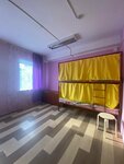 Кровать в общем 6-местном номере для женщин в Gorny
