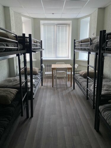 Кровать в общем номере для мужчин и женщин с 10 кроватями в Вахтовик