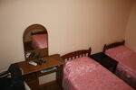 Двухместный номер с 2 отдельными кроватями и общей ванной комнатой в Гостевой дом на Приморском 17