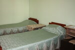 Двухместный номер с 2 отдельными кроватями и общей ванной комнатой в Гостевой дом на Приморском 17