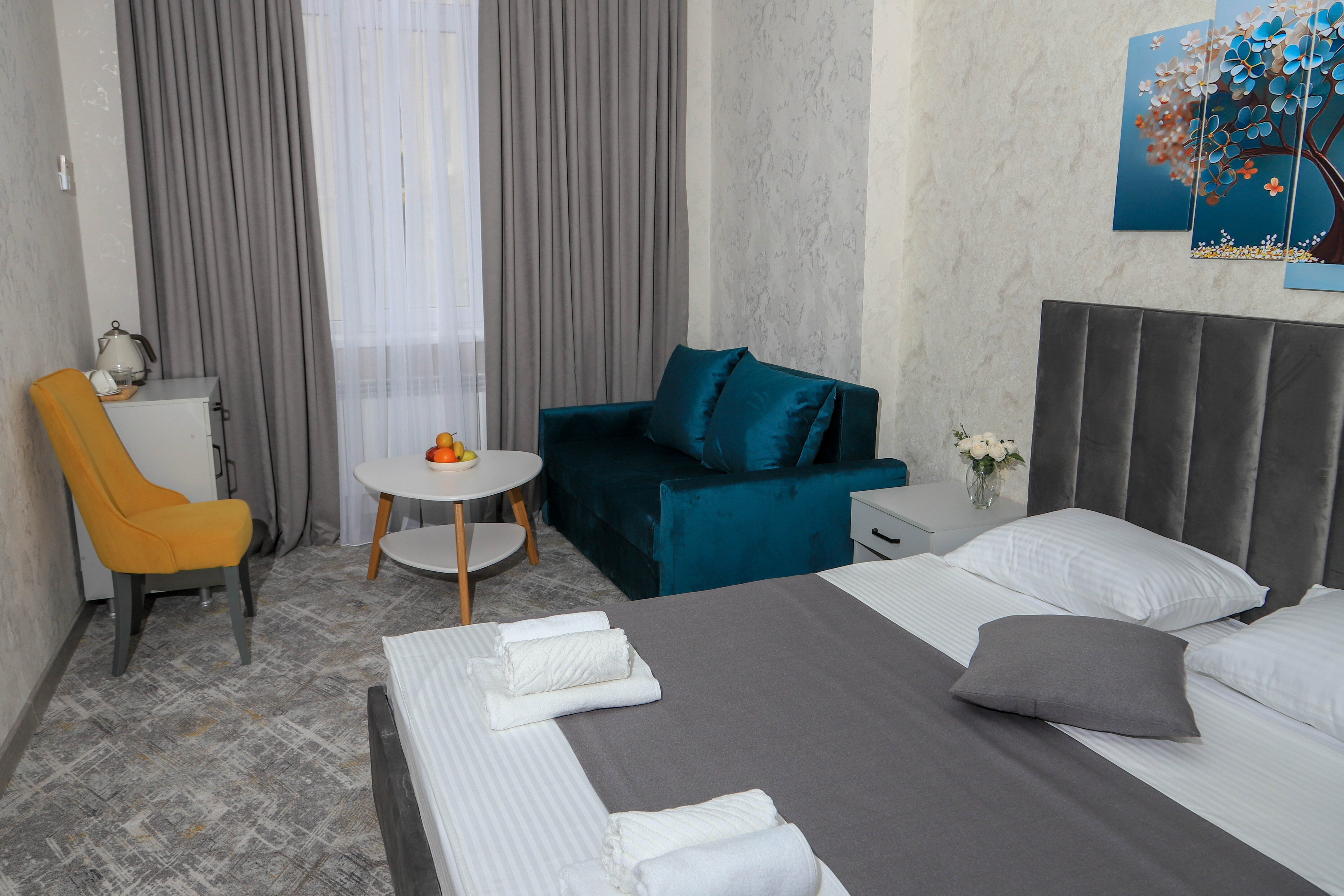 Трехместный номер Делюкс