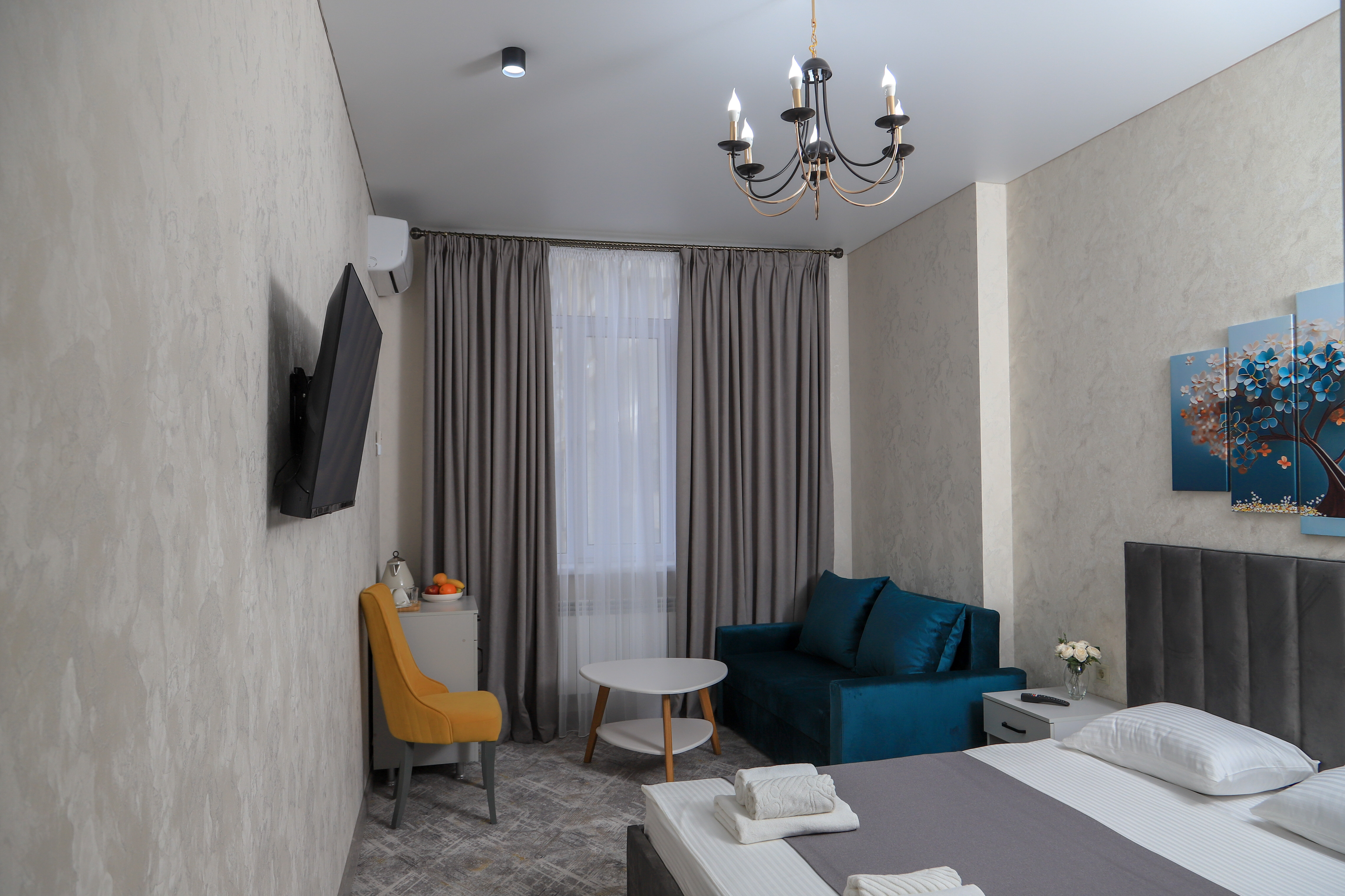 Трехместный номер Делюкс