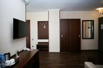 Семейный люкс, вид на море в Hotel Corner Inn