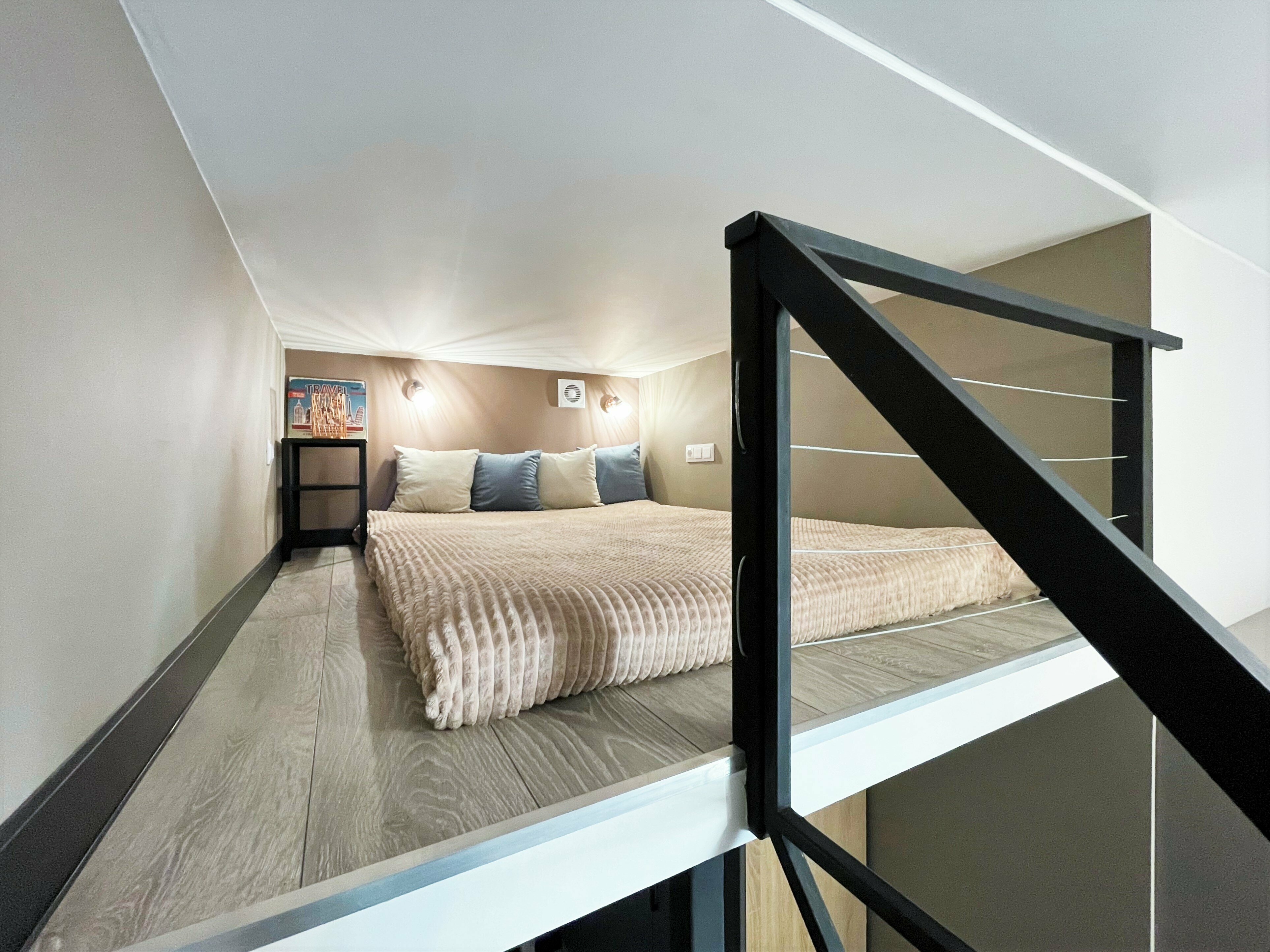 Двухуровневый номер-студия