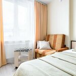 1-комнатные апартаменты стандарт с 1 односпальной и 1 двуспальной кроватью в Apartico на Парфеновской 7