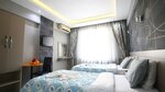 Номер с 2 односпальными кроватями в Fly Hotel