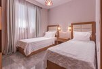 Представительский люкс в Dionysos Hotel & Suites