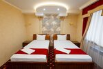 Двухместный номер «люкс» с 2 односпальными кроватями в Salut Hotel