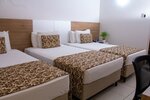Улучшенный трехместный номер в Quality Hotel & Suites Sao Salvador