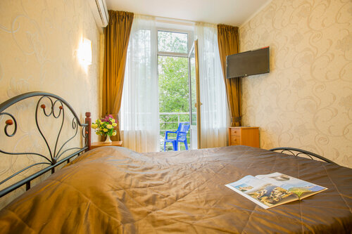 Трехместный номер с балконом в Восторг