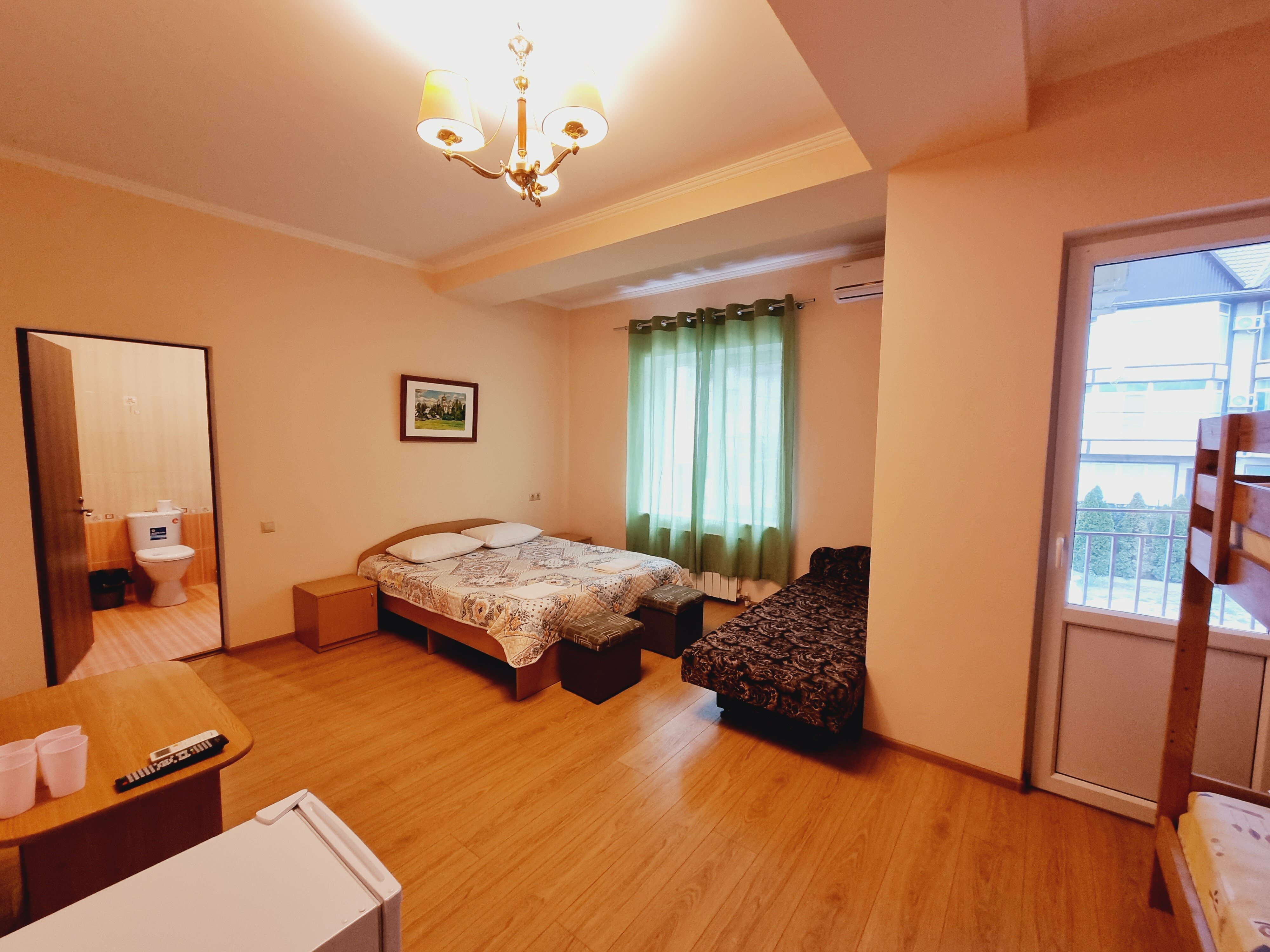 Четырехместный номер с балконом