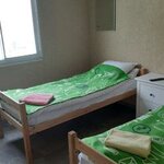 Кровать в 2-местном общем женском номере в Острова