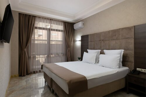 Улучшенный стандарт с одной двуспальной или двумя односпальными кроватями и балконом в Alcont by Stellar Hotels