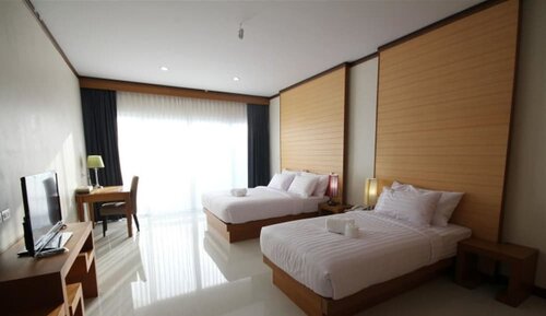 Стандартный трехместный номер в Taman SPA Resort