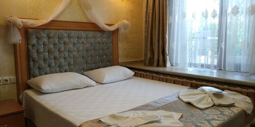 Двухместный номер «Эконом» с 1 двуспальной кроватью, вид на сад в Отель Seahouse Suites